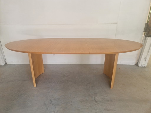 Postmodern extendable dining table