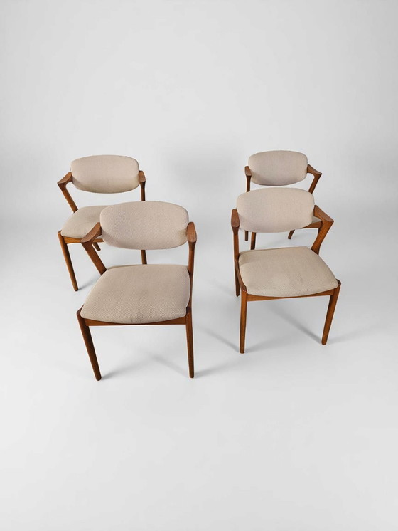 Image 1 of Lot de 4 chaises à accoudoirs en teck Chaises de salle à manger Chaises Kai Kristiansen Modèle 42