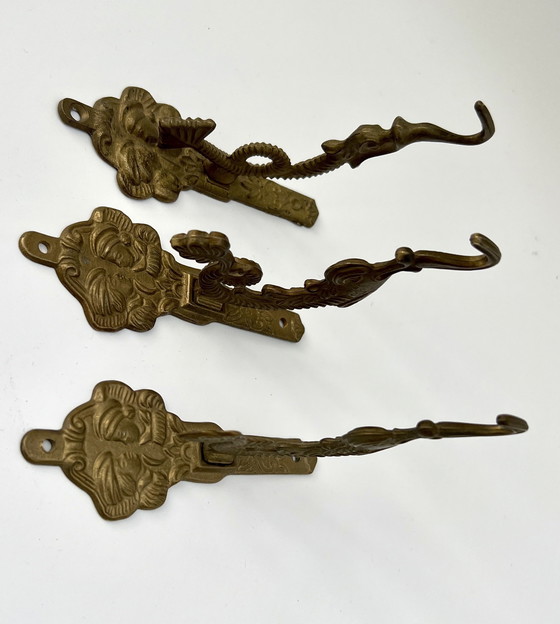 Image 1 of Set of 3 antique wall hooks – brass – Asian/Oriental inspired – circa 1950