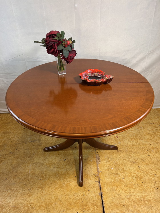Image 1 of Mid-Century Retro Vintage Teak Extending Round Dining Table by Parker Knoll – 1970  Elegant | Space-Saving | Practical | Iconic 