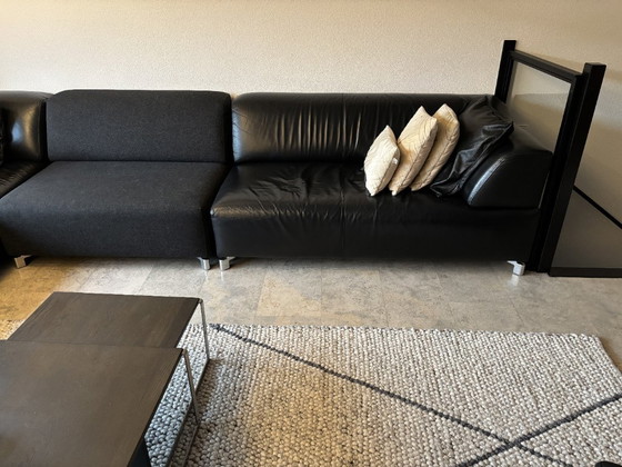Image 1 of Leolux Faya Lobi corner sofa with loose footstool - black leather and fabric loose element piece