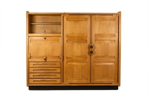 Guillerme e Chambron. Armadio in rovere con scrivania integrata. 1970-80