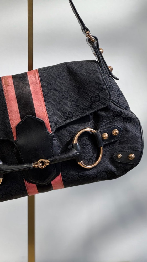 Image 1 of borsa con morsetto per cavalli