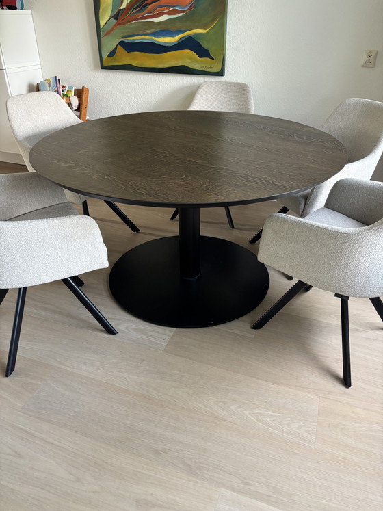 Image 1 of Round solid oak table with veneer top. Bought at Maison Manon.