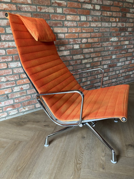 Herman Miller Eames EA 124 Lounge Chair - Arancione, Cromato