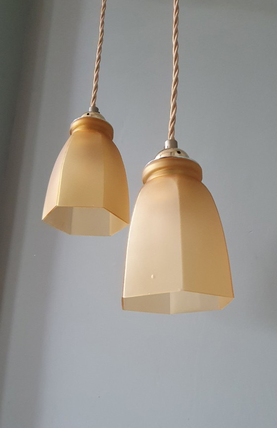 Image 1 of Set Vintage franse gele hanglampen van gekleurd glas.