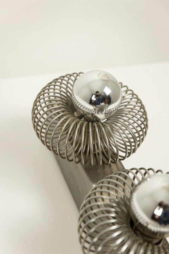 Image 1 of Andrea Lazzari. Applique da parete in metallo spazzolato. Anni '70.