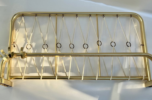 Porta giornali da parete vintage in ottone con elastici (circa anni '60)