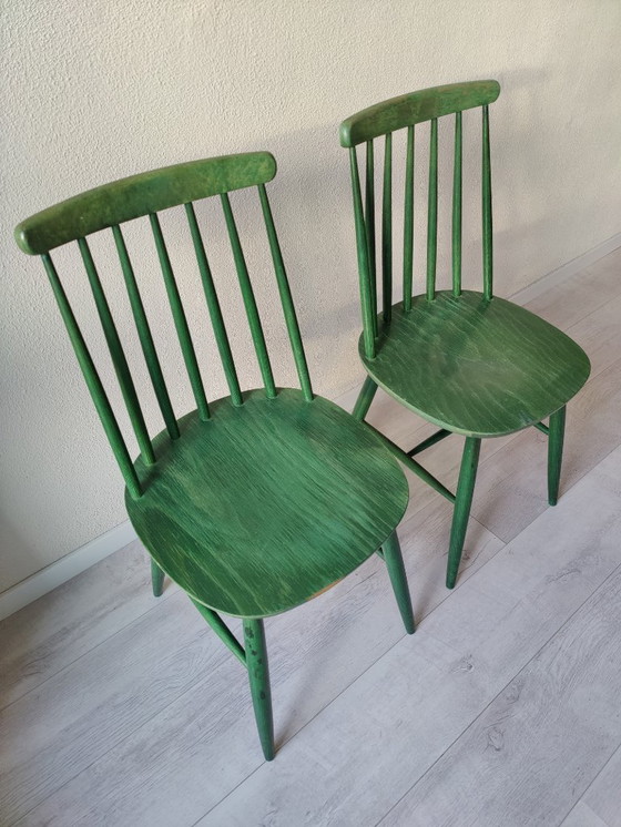 Image 1 of Two green slatted chairs - made by Tacke K. G.