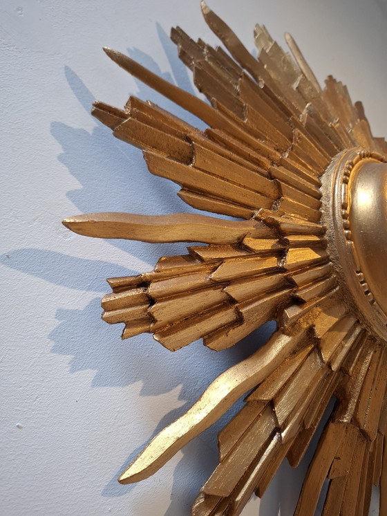 Image 1 of 46cm sun mirror in rare wood, 1950s version. Gold color.