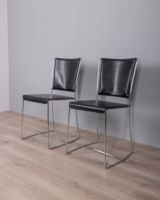 Image 1 of Een paar vintage leren stoelen uit de jaren 90, ontworpen door Segis Italia.