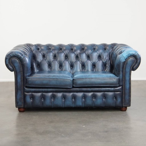 Canapé 2 places chesterfield en cuir de bœuf coloris bleu jean