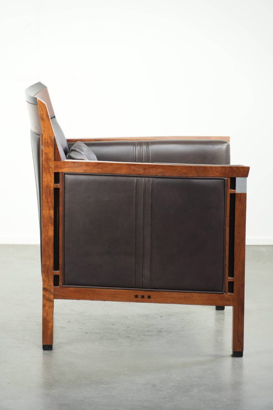 Image 1 of Luxe Schuitema Art Deco design set bestaande uit een fauteuil en hocker uit de Decoforma serie in chocolade bruin rundleer