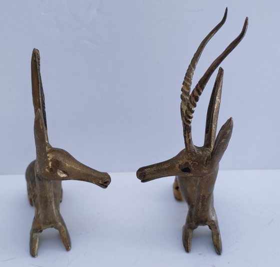 Image 1 of four gazelle antelope sculptures vintage brass
