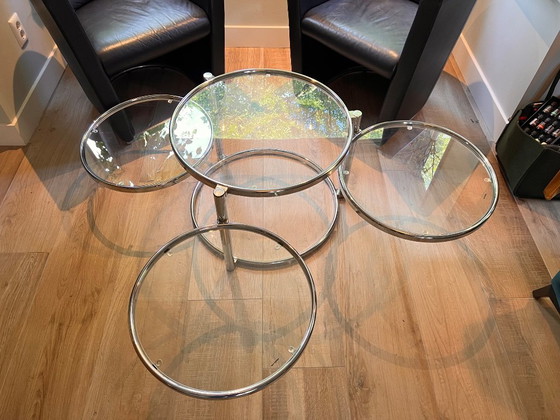 Unique vintage Italian coffee table with chrome frame and four round glass tops. Three outer tops can be (photo 5 of 10)