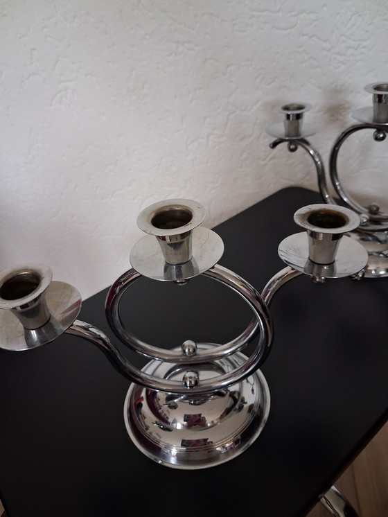 Image 1 of 2 three-armed candlesticks. Demeyere