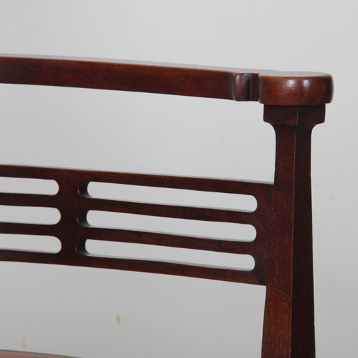 Engelse fauteuil van J.S. Henry, Arts and Crafts-stijl, eind 19e eeuw.
