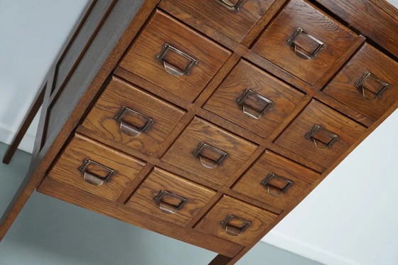 Image 1 of Antieke Nederlandse eiken apothekers- / archiefkast, jaren 1930