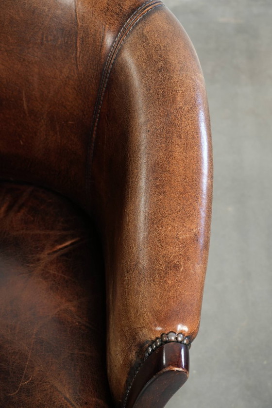 Image 1 of 2x handige schapenleren bijzetstoel/ fauteuil/tubchair met karakter en een mooi patina