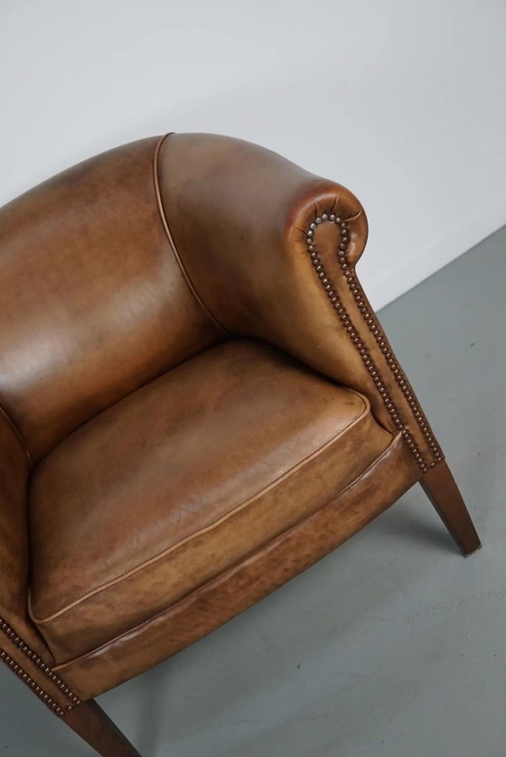 Image 1 of Vintage Nederlandse clubfauteuil van cognackleurig leer