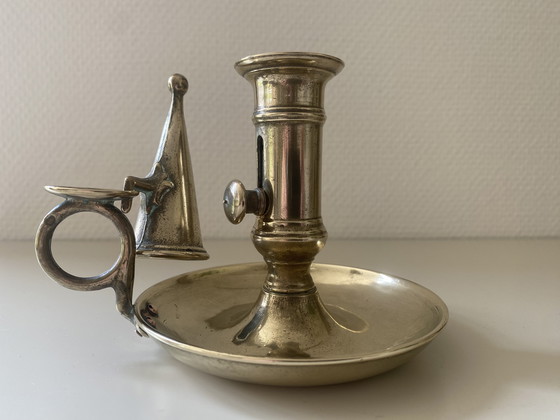 Image 1 of Antique candlestick in solid bronze