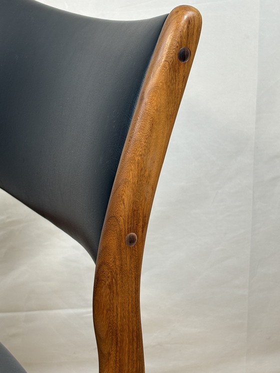 Image 1 of Mid-Century Retro Set of 8 Dining Chairs by Johannes Andersen for Uldum Møbelfabrik 1960  Elevate your dining space with this st