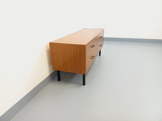 Image 1 of Small vintage modernist style sideboard in teak and metal from the 1960s