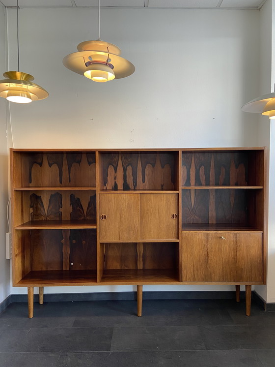 Image 1 of Vintage Rosewood Bookcase With Sliding Doors and Bar