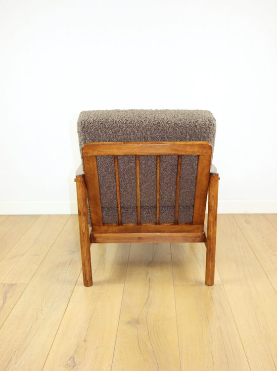 Image 1 of Houten fauteuil ontworpen door Z. Baczyk, bruin vintage chocoladebruin bouclé lamsleer