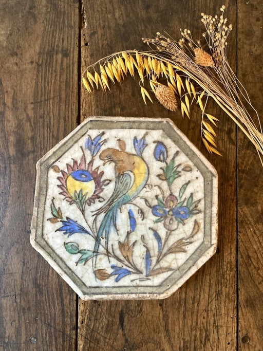 Antique Persian tile in glazed earthenware