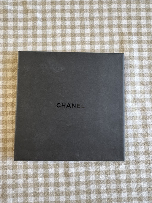 Raro león Chanel Tangram