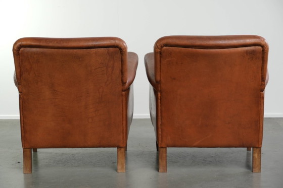 2x Fauteuils en cuir de mouton beaux et confortables avec de belles couleurs et un design intemporel (photo 3 of 14)