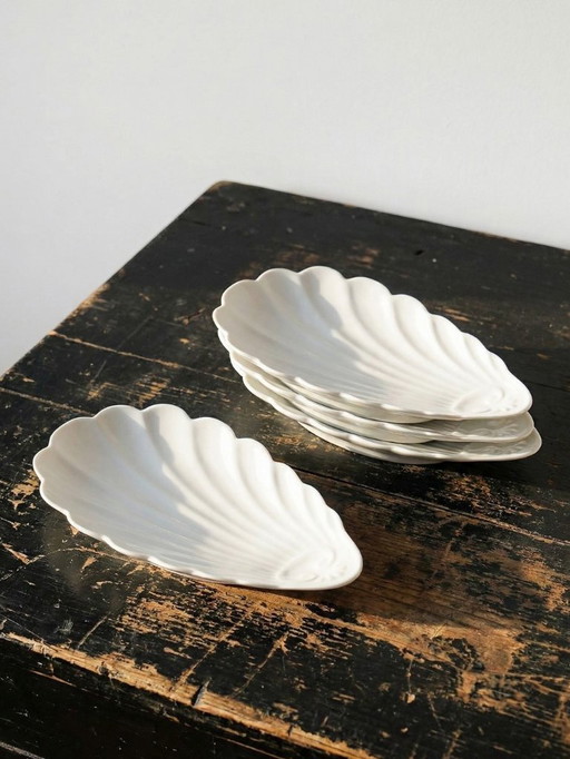 4 vintage rococo-style white porcelain Limoges dishes with seashells