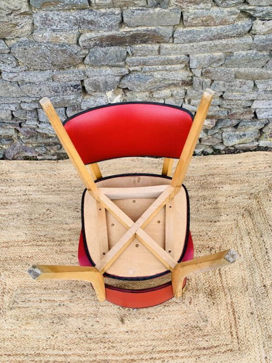 Image 1 of Ein Paar rote Stühle