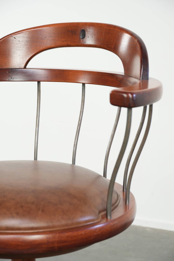 Image 1 of Draaibare Schuitema stoel/ bijzetstoel/ bureaustoel met een cognac kleurige rundleren zitting