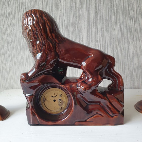 Image 1 of Leone con orologio e 2 candelieri 1920-1930