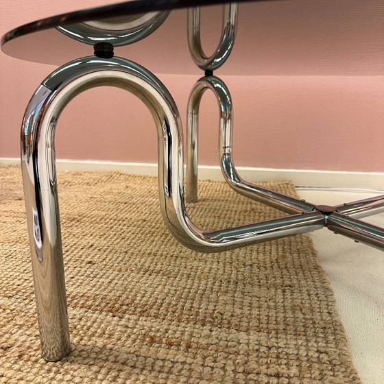 Image 1 of Curved tubular chrome coffee table with round glass top