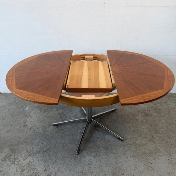 Image 1 of Mid-century round dining table, teak, chrome legs – extendable | 1960s