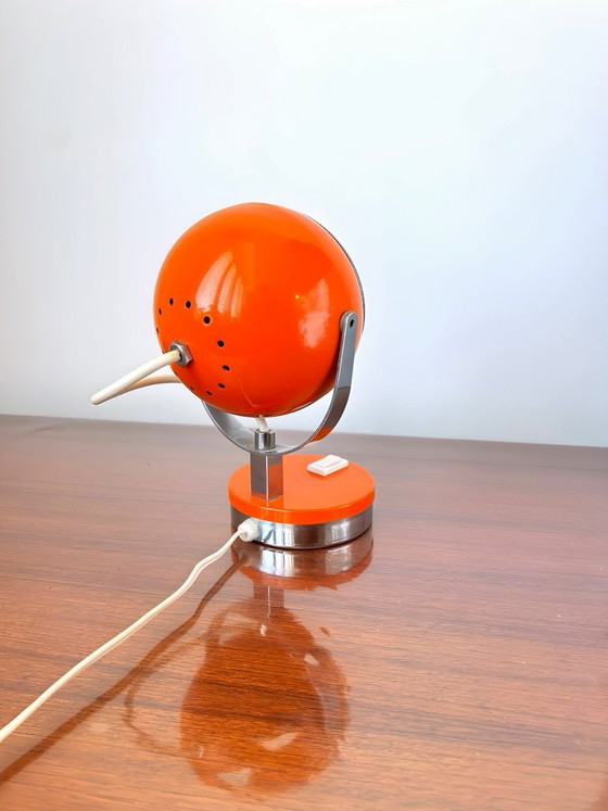 Image 1 of Set van 2 oranje oogbollampen, 1970.