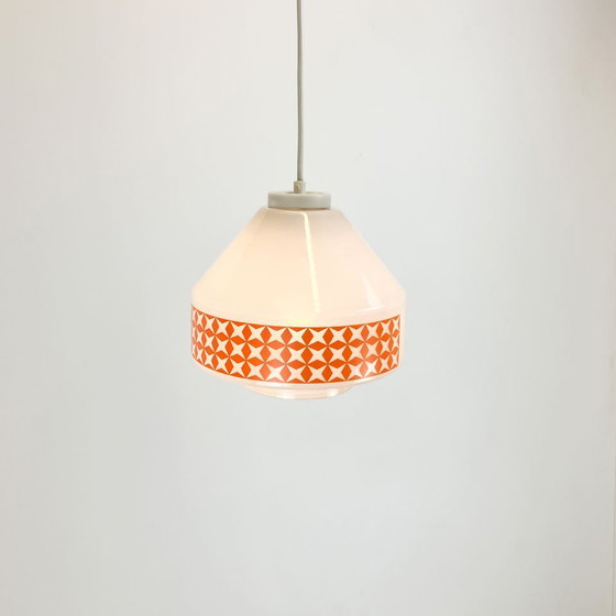 Image 1 of pendant lamp, opal glass with orange pattern, GDR of the 1970s