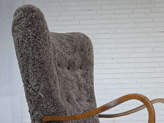 Image 1 of 1960s Reupholstered Danish Armchair with Stool, Genuine Sheepskin