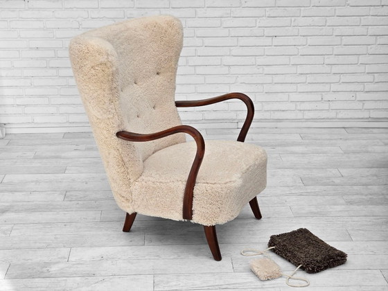 Image 1 of Jaren 60, Deens ontwerp van A. Christensen voor Slagelse Møbelværk, schapenvacht.