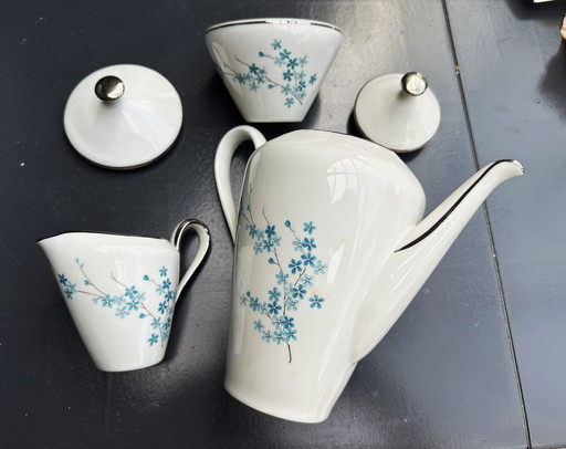 Genuine Sofafils de Limoges porcelain coffee/tea service with forget-me-not decoration