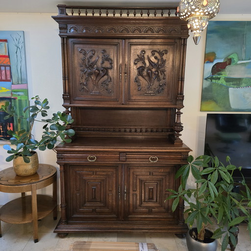 Antique wooden cabinet with lots of storage space