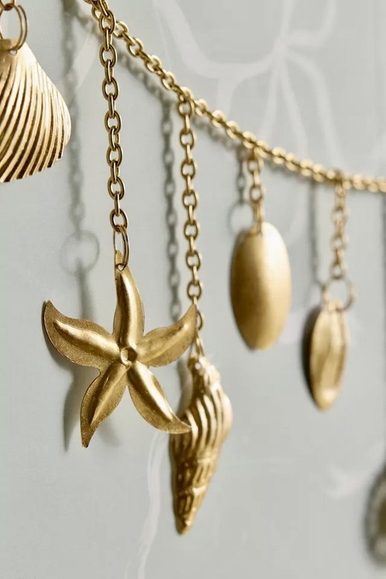 Image 1 of Wanddeco wanddecoratie met gouden zeethema-bedels