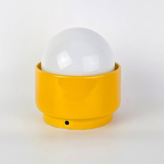 Image 1 of Vintage German ceramic lamp with a glass globe shade. Can be used as a wall lamp, table lamp, or sconce. Yellow. 70s / retro