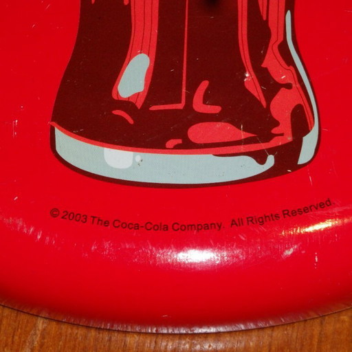 Coca-Cola button sign