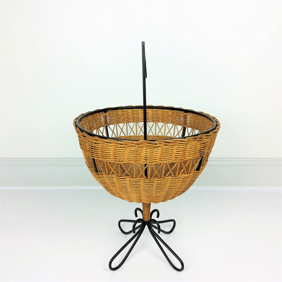 Image 1 of Vintage rattan basket on 4 black lacquered metal legs, 1950