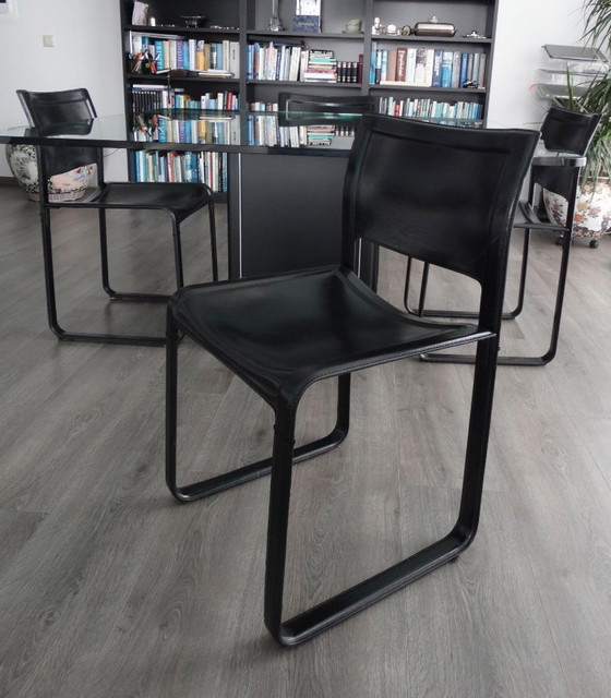 Image 1 of Table de salle à manger en verre avec 4 chaises en cuir