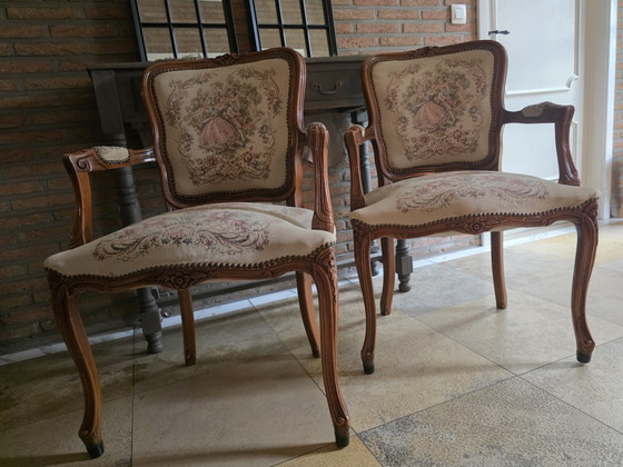 Image 1 of 2 classic armchairs in elegant Louis XV style.